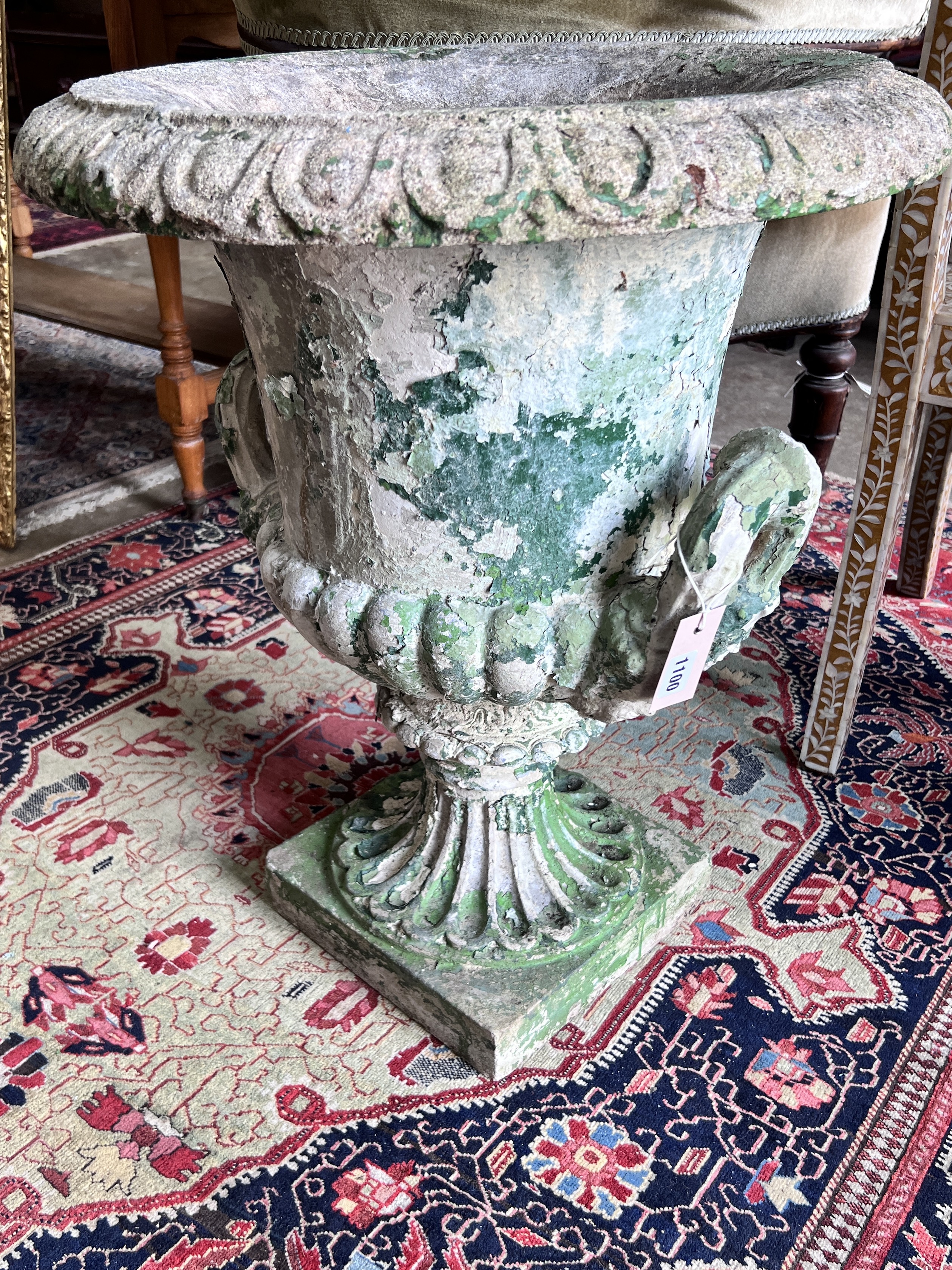 A painted reconstituted stone campana garden urn, width 53cm, height 63cm